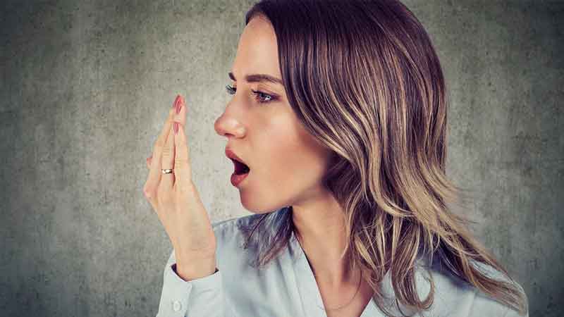 If you are troubled by bad breath follow these home remedies