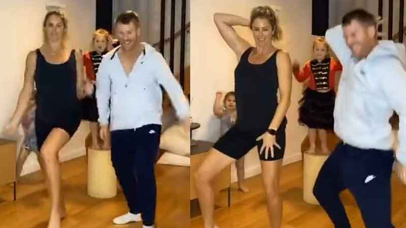 Warner dances with wife and daughters, video goes viral