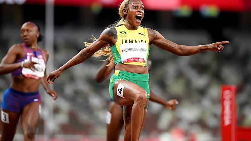 Thompson-Hera breaks Olympic record in women's 100 meters, wins gold medal for the second time in a row